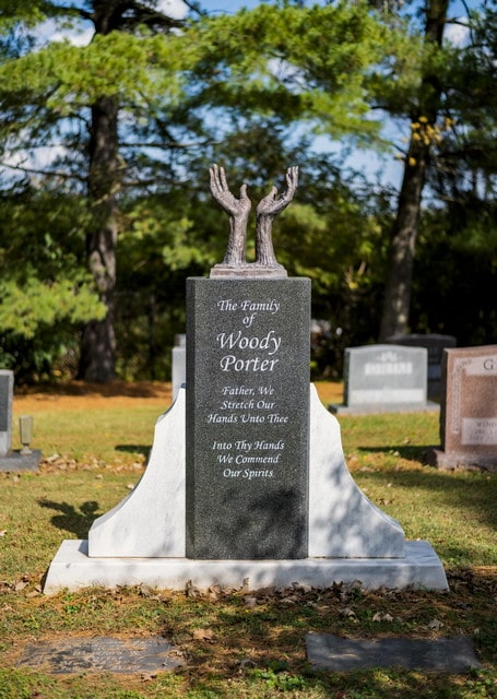 Porter Monument with Bronze Hands Reaching into the Sky